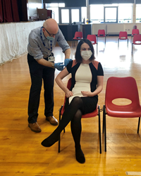 Inverclyde community flu vaccination programme at Port Glasgow Town Hall. Pictured receiving a jab is Inverclyde Health & Social Care Partnership (HSCP) chief officer Louise Long